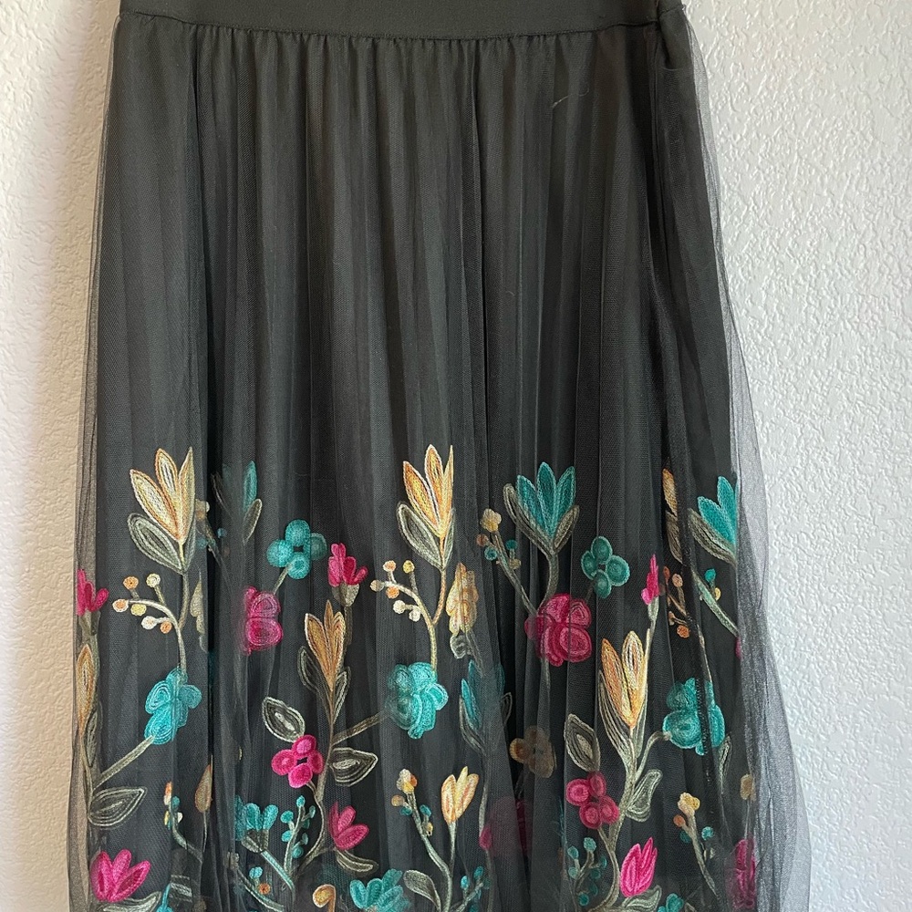 Soft skirt. Floral, pretty black see thru overlay.